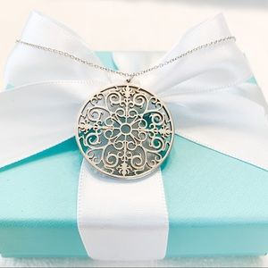 Tiffany & Co. Enchant Circle Scroll Pendant